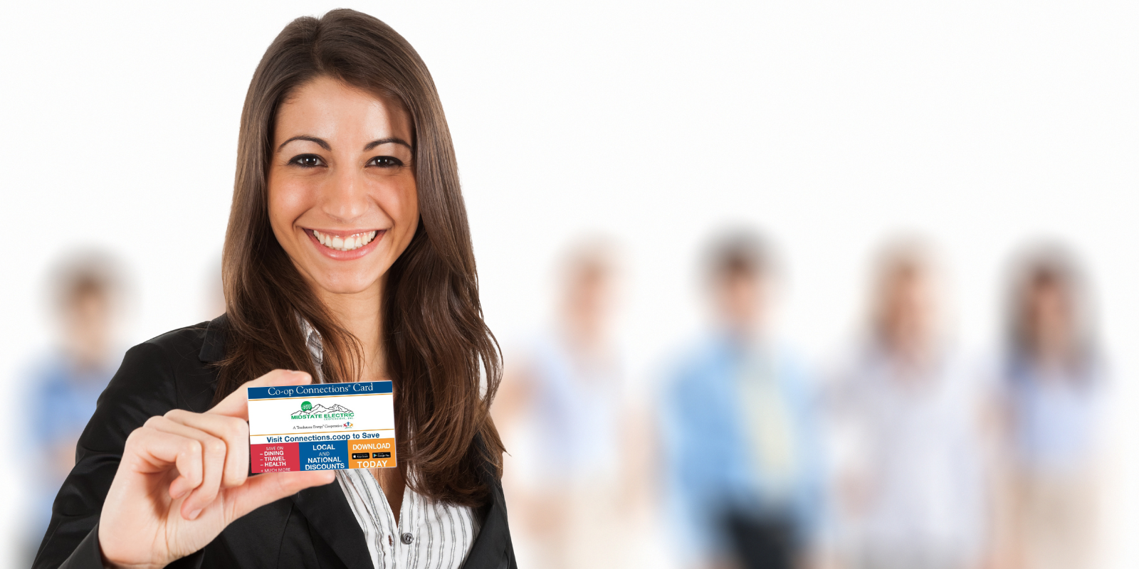 Woman holding Co-op Connections Card